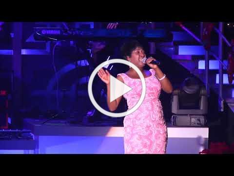 Denita Asberry as Aretha Franklin